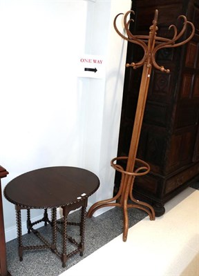Lot 1330 - A bentwood hat stand, 198cm, together with a barley twist gateleg occasional table