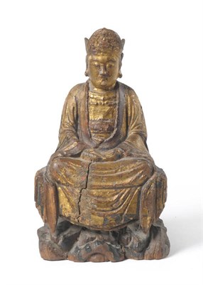 Lot 185 - A Chinese Carved, Parcel Gilt and Polychrome Painted Figure of Guanyin, late Ming Dynasty, 17th...