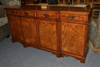 Lot 1344 - A reproduction inlaid burr walnut break front side board by Iain James, retailed by Elphicks,...