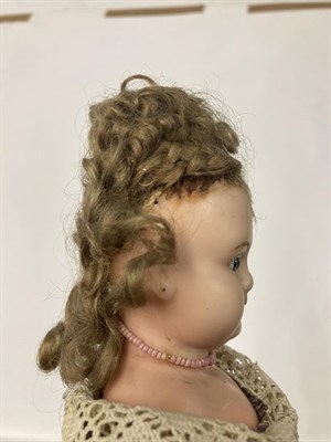 Lot 2000 - Late 19th Century Wax Shoulder and Head Doll, with composition lower arms and legs painted with...