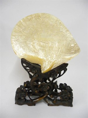 Lot 186 - A Chinese Relief Carved Mother-of-Pearl Half Shell (Silver-Lipped Pearl Oyster - Pinctada...