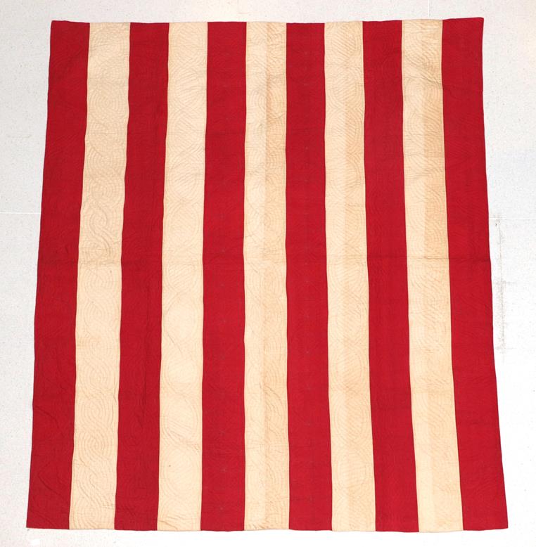 Lot 2017 - Late 19th Century Turkey Red and White Strippy Quilt, with stylish alternating rows of...