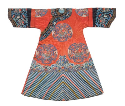 Lot 188 - A Chinese Silk Embroidered Robe, 1850-1900, with deep coral ground, worked overall with...