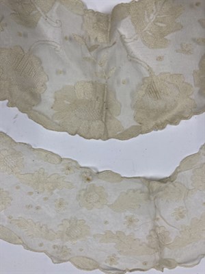 Lot 2031 - A Late 19th Century/Early 20th Century Cream Lace Cape, of decorative floral design with a...