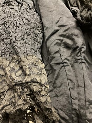 Lot 2048 - Late 19th/Early 20th Century Ladies' Clothing, comprising a black silk bodice with buttons to...