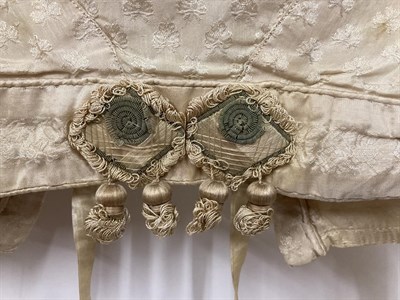 Lot 2049 - An Early 19th Century Regency Cream Figured Silk Wedding Jacket, woven with clovers, decorated with