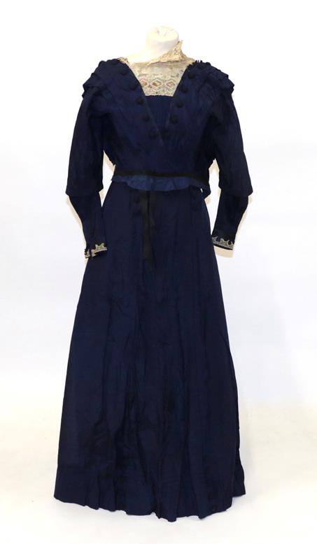 Lot 2053 - 19th Century Ladies' Two Piece Costume, comprising a blue silk bodice with woven buttons to the...