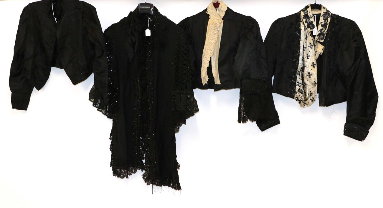 Lot 2055 - Circa Late 19th Century Ladies' Costume,  comprising a black silk shoulder cape with open braid...