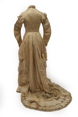 Lot 2058 - Victorian Cream Figured Silk Wedding Dress, labelled inside Miss Wharton 34 Duke Street...