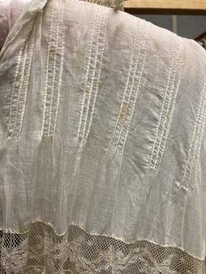 Lot 2060 - Late 19th Early 20th Century Ladies' Costume, comprising a cream net sleeveless dress with a double