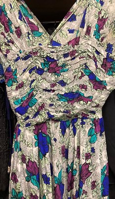 Lot 2061 - Circa 1920-30s Day and Evening Wear, comprising a short sleeved orange and grey floral day...