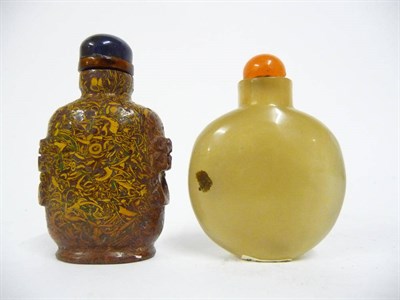 Lot 192 - A Chinese Chalcedony Snuff Bottle, Qing Dynasty, probably 19th century, of flattened rounded...