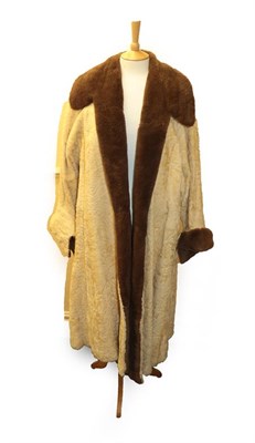 Lot 2070 - Revillon Red Fox Long Sleeved Jacket with zip fastening; and a Circa 1930s Cream Astracan Long...