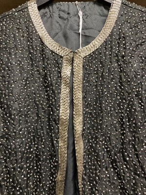 Lot 2086 - Circa 1950s Beaded Evening Wear, comprising a cream sleeveless wool top, with scoop neck line,...