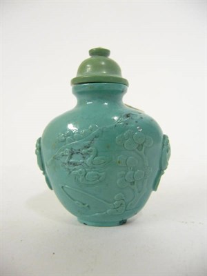 Lot 195 - A Chinese Carved Turquoise Snuff Bottle, Qing Dynasty (1750-1850), of flattened shouldered...