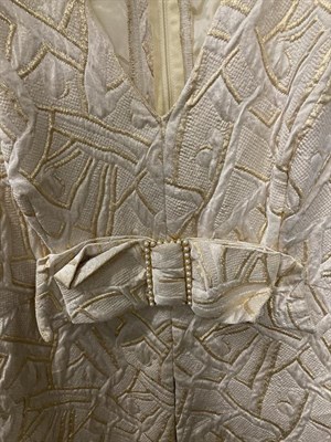 Lot 2101 - Circa 1970s Ladies' Evening Wear, comprising a California cream and gold quilted sleeveless...