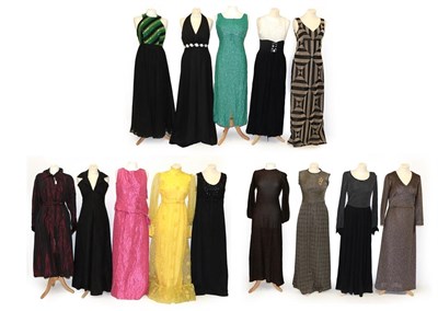Lot 2102 - Circa 1970s Ladies' Evening Wear, comprising five metallic jersey full-length dresses, with...