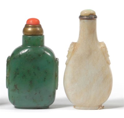 Lot 197 - A Chinese White Jade Snuff Bottle, Qing Dynasty, of flattened bag shape, carved in relief on...