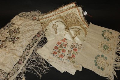 Lot 2117 - Late 19th Century Ottoman Linen Towel, embroidered with three cream and blue flowerheads to...