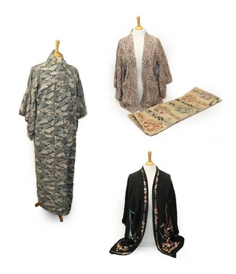 Lot 2118 - 20th Century Eastern Costume, comprising a black short silk kimono jacket with floral embroidery to