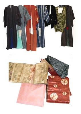 Lot 2123 - Seven 20th Century Japanese Silk Kimonos, in decorative stripes, checks and other designs, and...