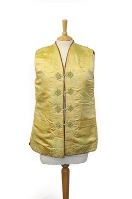 Lot 2125 - Early 20th Century Yellow Chinese Brocade Waistcoat, with toggle fastenings and a brown wool lining