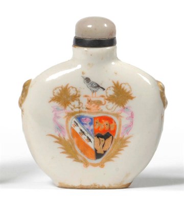 Lot 198 - A Chinese Armorial Porcelain Snuff Bottle, Qing Dynasty, of flattened rounded form, relief...