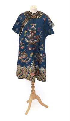 Lot 2126 - An Early 20th Century Chinese Blue Silk Robe, embroidered with dragons to the front and back,...