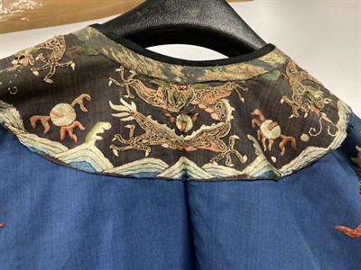 Lot 2126 - An Early 20th Century Chinese Blue Silk Robe, embroidered with dragons to the front and back,...