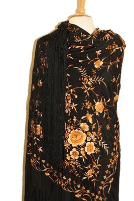 Lot 2133 - Early 20th Chinese Black Silk Shawl, embroidered overall with orange and peach silk...