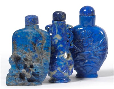 Lot 200 - Three Lapis Lazuli Snuff Bottles, Qing Dynasty and later, comprising a slim shouldered example...