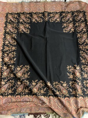 Lot 2148 - 19th Century Woven Paisley Shawl, with black centre and decorative trim, 170cm square; large...