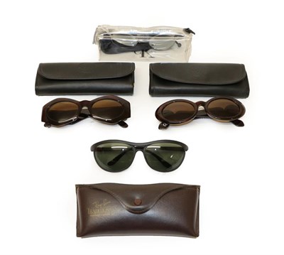 Lot 2171 - Two Pairs of Versace Tortoiseshell Coloured Framed Sunglasses, models 422A and 527, both with brown