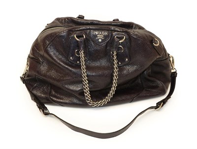 Lot 2184 - Prada Purple Bauletto Bag or Overnight Bag, in crackle glaze deerskin leather with chrome hardware
