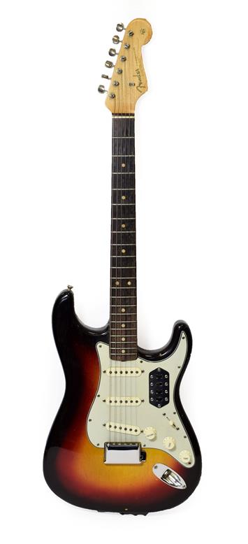 Lot 3036 - Fender Stratocaster Guitar (1963) serial no.L17506 on four screw plate, black sunburst finish...