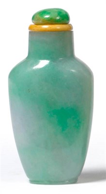 Lot 210 - A Chinese Jade Snuff Bottle, Qing Dynasty, of flattened and tapering shouldered form, jade "pebble"