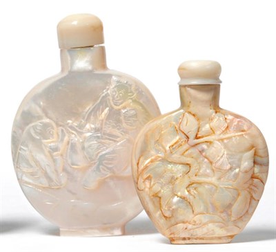 Lot 211 - A Chinese Solid Mother-of-Pearl Snuff Bottle, late Qing Dynasty, of flattened round form, decorated