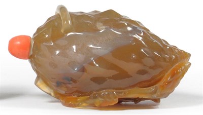 Lot 221 - A Chinese Agate Snuff Bottle, Qing Dynasty, as an ovoid knobbly fruit entwined with tendrils...