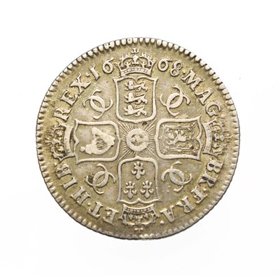 Lot 4009 - Charles II, 1668 Shilling. Obv: Second, laureate and draped bust right. Rev: Cruciform shields with
