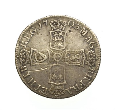 Lot 4017 - Anne, 1703 'VIGO' Shilling. Obv: Second, draped bust left. Rev: Cruciform shields. S. 3586. Fine.