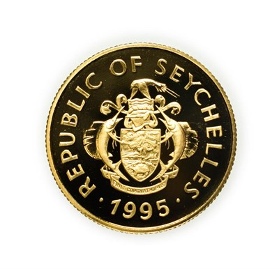 Lot 4199 - Seychelles, 1995 Gold Proof 100 Rupees. 7.78 g 14ct gold. Obv: Coat of arms of Seychelles. Rev:...