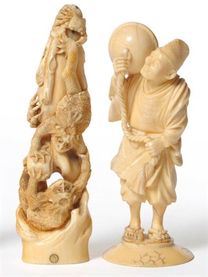 Lot 245 - A Japanese One Piece Carved Elephant Ivory Okimono, Meiji period (1868-1912), as two cappa crawling