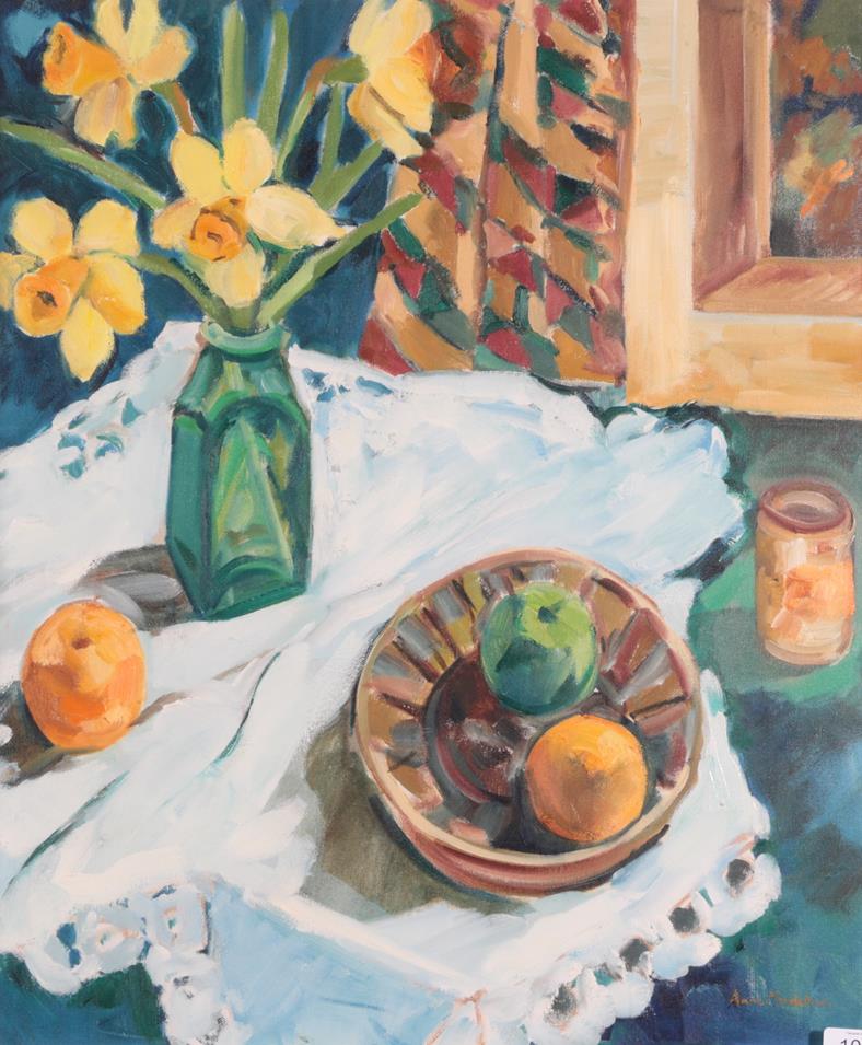 Lot 1055 - Anne Mendelow (b.1945) Still life of daffodils in a green vase and fruit on a white tablecloth...