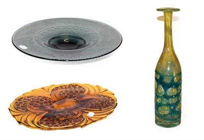 Lot 16 - A Mdina glass bottle vase, 33cm, an amber moulded glass dish, 39cm and a smokey glass pedestal bowl