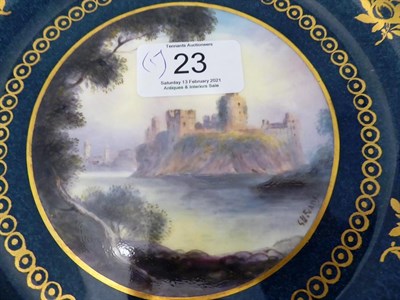 Lot 23 - A Royal Worcester powder blue ground plate with scalloped edge, painted by George Evans with a...