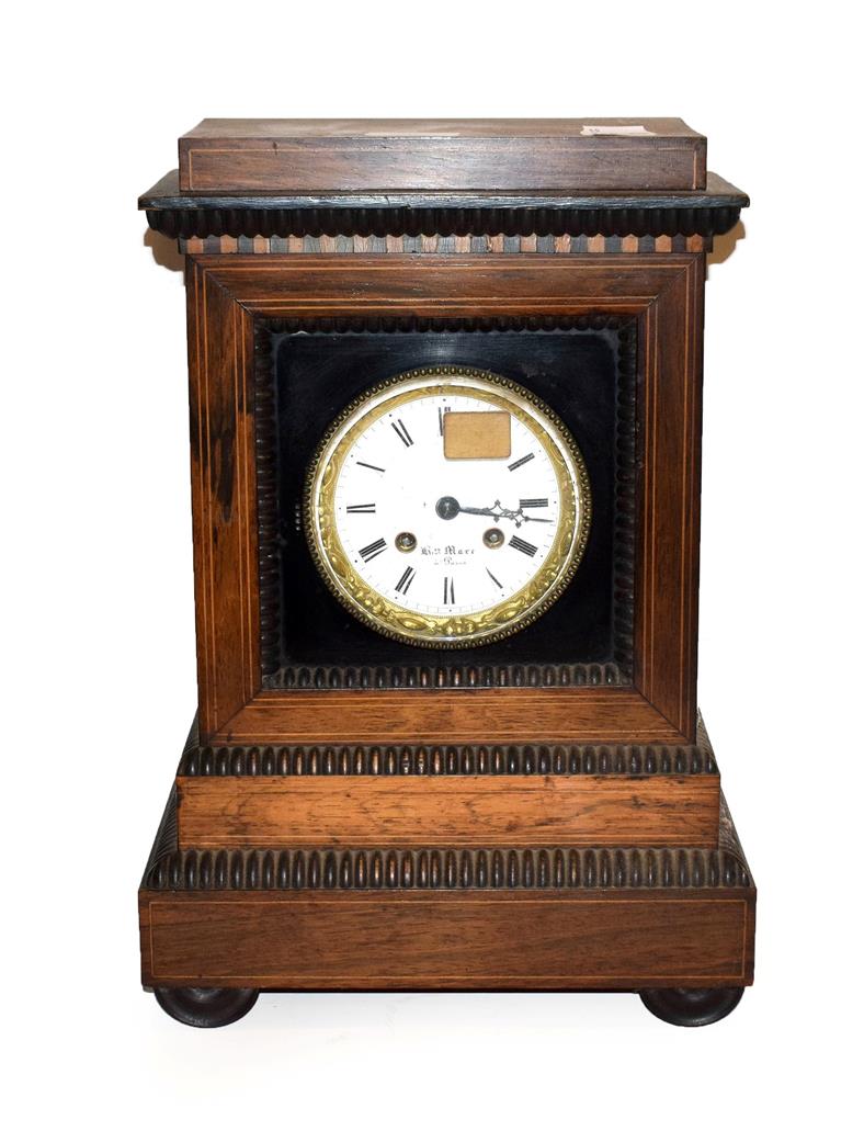 Lot 36 - A 19th century French inlaid rosewood striking mantel clock, with gilt bezel and enamel dial singed
