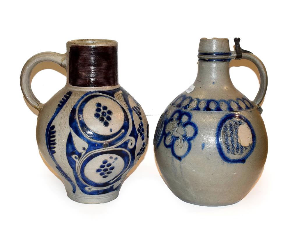 Lot 45 - Two 18th century German Westerwald salt glazed stoneware flagons, one with a Royal monogram GR, the