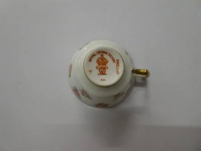 Lot 49 - A collection of porcelain miniatures to include a King Street Derby dolls house teapot and...