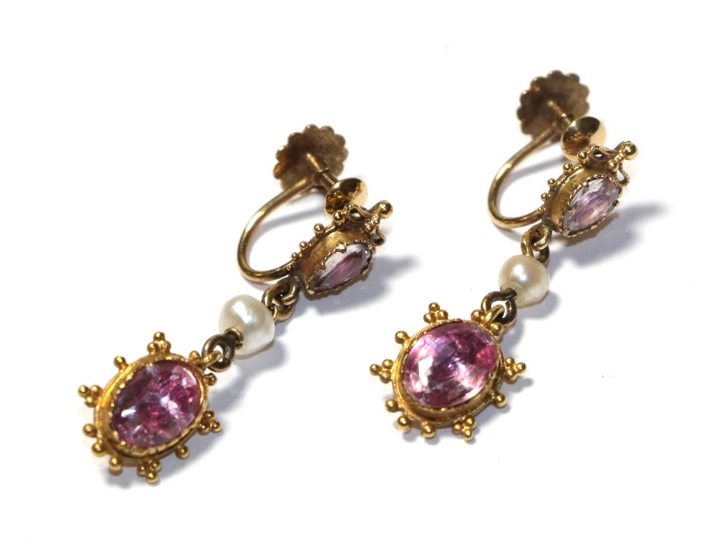 Lot 62 - A pair of early 19th century pink tourmaline and seed pearl drop earrings, the oval cut pink...
