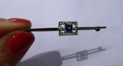 Lot 82 - A sapphire and diamond bar brooch, stamped '9CT', length 5.2cm and a pair of sapphire and...
